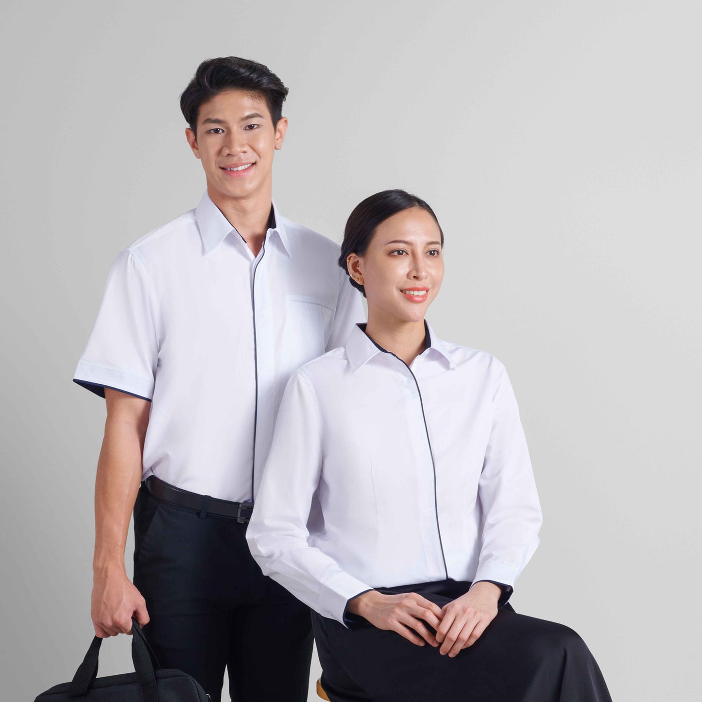 F150 unisex and F151 female corporate uniform shirts worn by models