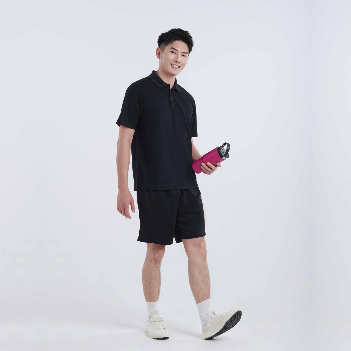 QD100 polo shirt worn by a model