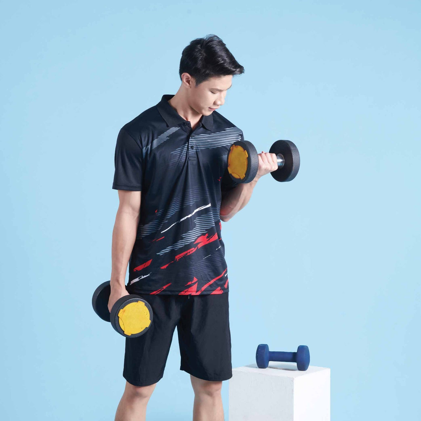 Model wearing the QD76 unisex sublimation mini eyelet polo shirt, showing the all-over printed design