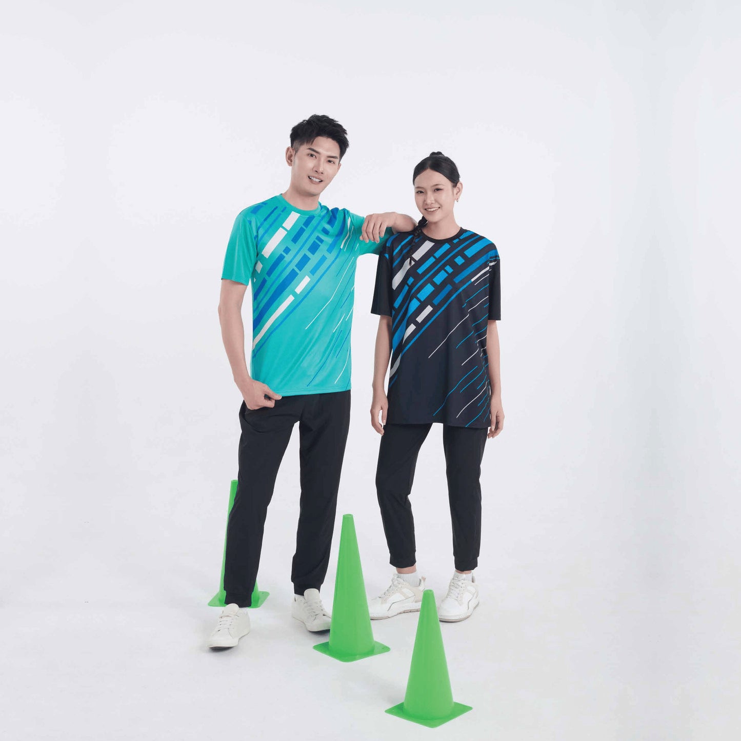 Model wearing the QD93 unisex sublimation mini eyelet t-shirt, showing the all-over printed design