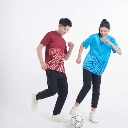 Models wearing the QD95 unisex sublimation mini eyelet t-shirt, showing the all-over printed design