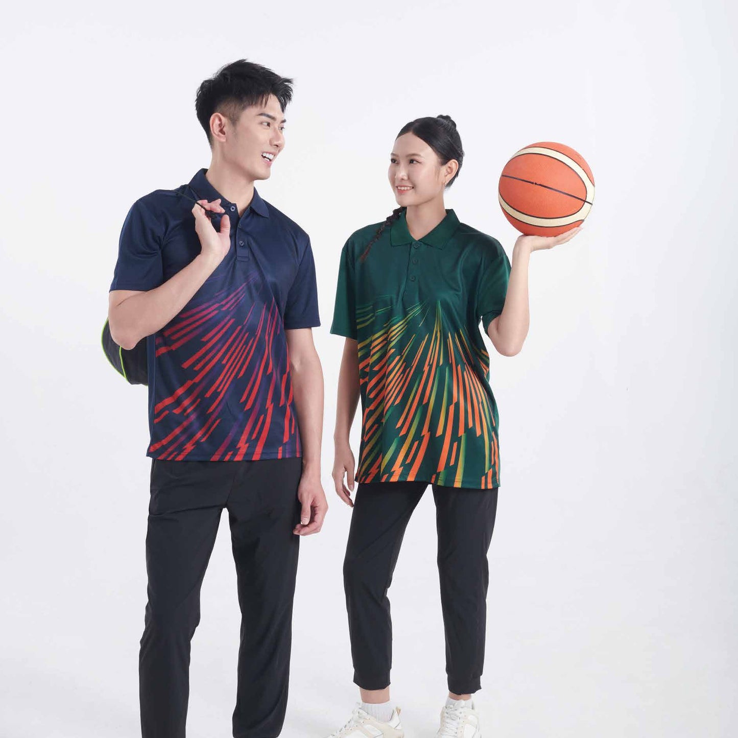 Models wearing the QD96 unisex sublimation mini eyelet polo shirt, showing the all-over printed design
