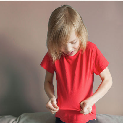 Young girl wearing the AX02 Axton kids CVC cotton short sleeve t-shirt in red