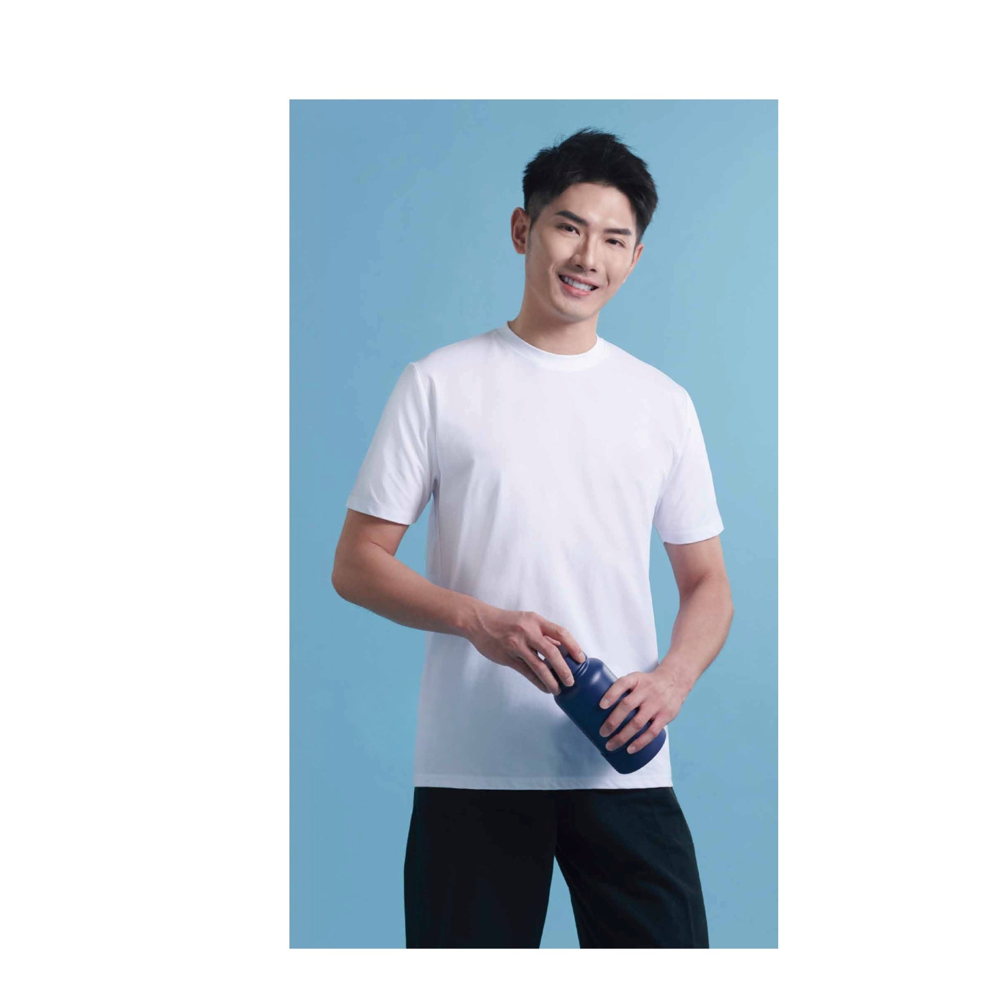Man wearing the AX03 Axton unisex polyester cotton-feel short sleeve t-shirt in white